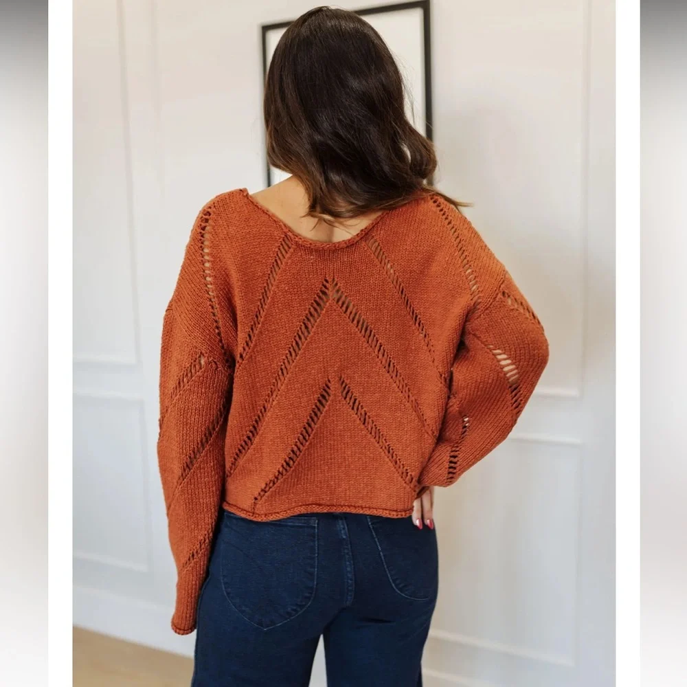 The orange Autumn Glaze Distressed‎ Sweater is Sz Medium